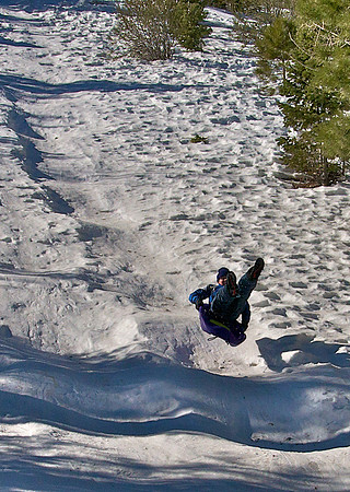 A Sledder descends a slope on Mt. Charleston