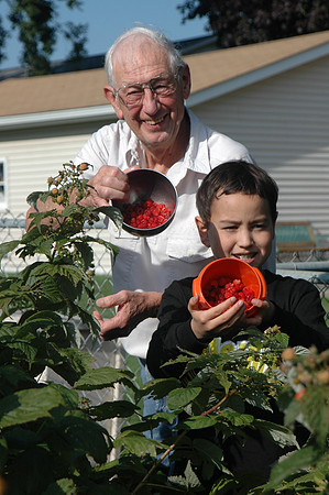 Shirel and Seiji with the Raspberry Harvest